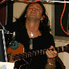 Dave plays the guitar